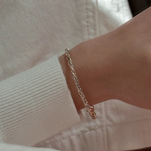 Three-tone braided S925 sterling silver chain bracelet in gold, silver, and rose gold