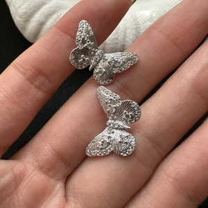 Elegant S925 sterling silver butterfly earrings with micro-set diamonds on wings