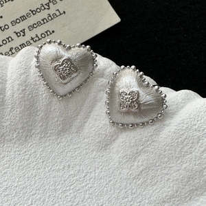 Minimalist S925 sterling silver heart earrings with brushed finish and zircon floral center