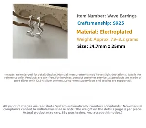 Macro shot of S925 sterling silver hoop earrings with a textured wavy design