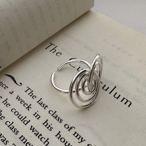 Minimalist S925 sterling silver multi-layered spiral open ring on vintage book pages