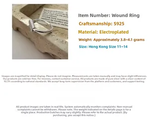 Close-up of S925 sterling silver wrap ring on stone tray with weight and size details