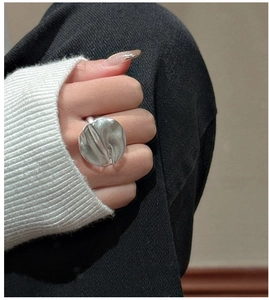 Detailed view of large S925 sterling silver ring with unique 3D wrinkled texture and matte finish