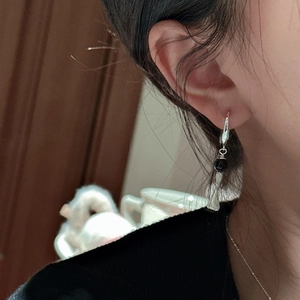 Handcrafted S925 sterling silver hoop earrings with black beads and textured metal drops