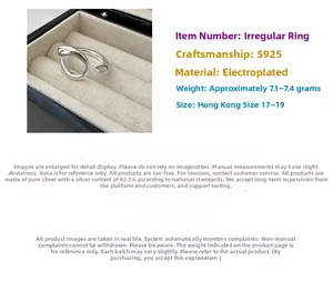 Macro view of minimalist irregular S925 sterling silver ring showing size and weight