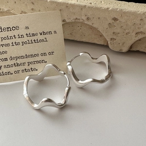 Minimalist S925 sterling silver hoop earrings with a matte wavy irregular design