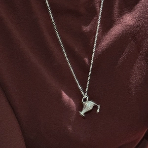 S925 sterling silver necklace featuring a minimalist matte water bottle pendant on a fine chain