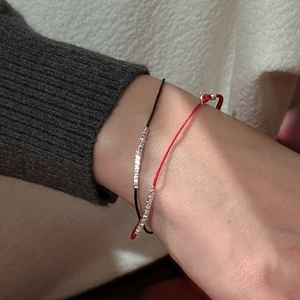 Minimalist red and black Morse code bracelets with S925 silver beads on female wrist