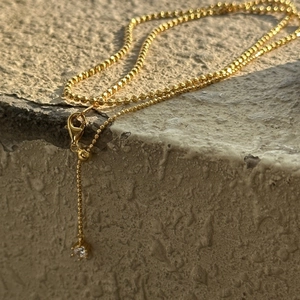 Elegant gold-plated S925 sterling silver bead necklace with a single zircon pendant