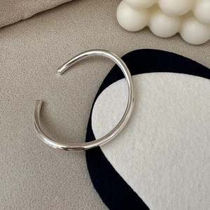 Minimalist S925 sterling silver open bangle bracelet with a polished glossy finish