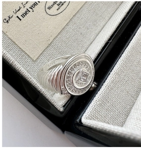 Detail view of S925 silver vintage ring with square zircon and engraved hallmark