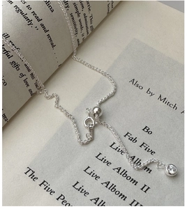 Detailed view of S925 silver necklace with adjustable slide bead and zircon pendant
