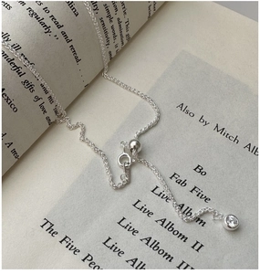 Detail of S925 silver Chopin chain necklace featuring adjustable bead and zircon pendant