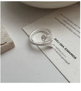 Macro detail of S925 sterling silver irregular ring with frosted matte texture finish