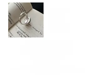 Macro shot of S925 sterling silver coffee cup ring with polished finish details