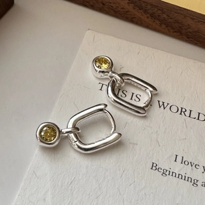 Elegant S925 sterling silver hoop earrings with round yellow gemstone and geometric charm