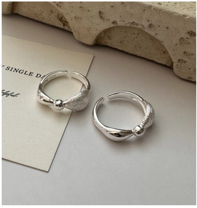 Detail of S925 sterling silver ring showing brushed texture and S925 hallmark