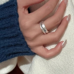 S925 sterling silver brushed ring with black zircon stones in a modern vintage style