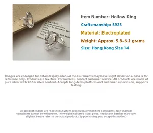 Detail view of S925 sterling silver rings with hollow sunburst geometric patterns