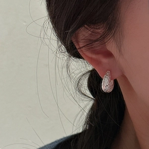 Minimalist S925 sterling silver hoop earrings with unique molten lava textured finish