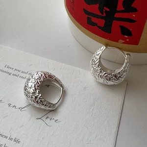 Minimalist S925 sterling silver hoop earrings with unique lava texture and polished finish