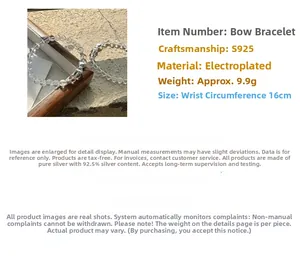 Detail view of S925 sterling silver bow bracelet with clear crystal beads on elastic cord