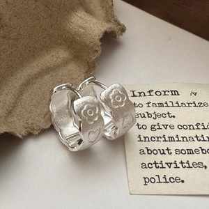 S925 sterling silver hoop earrings with brushed flower and heart embossed patterns