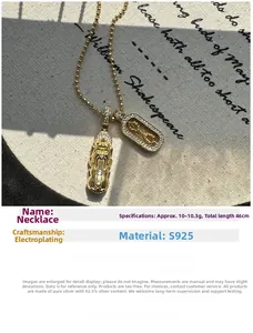 Macro shot of S925 silver Pixiu pendant necklace with gold plating and white zircons