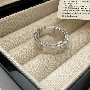 S925 sterling silver open ring with irregular hammered texture and pavé set zircons
