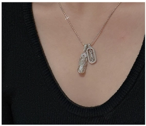Detail of S925 sterling silver bead chain with vajra and double pendant necklace