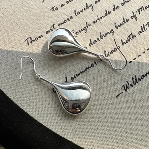 Elegant S925 sterling silver hollow teardrop earrings with a polished mirror finish