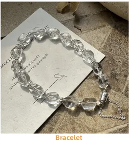 Detail of minimalist S925 silver beaded bracelet with clear faceted crystal stones
