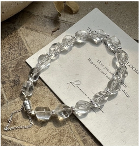 Detail of S925 silver bracelet featuring irregular faceted beads and magnetic clasp