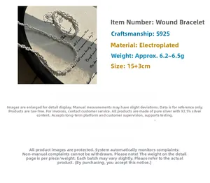 Macro detail of S925 sterling silver beaded bracelet showing intricate metal texture