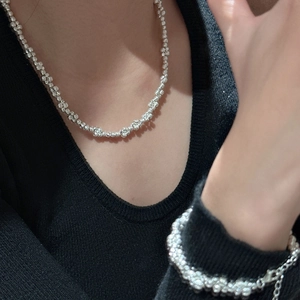 Minimalist S925 sterling silver beaded jewelry set with shimmering textured necklace and bracelet