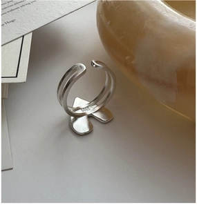 Detailed view of S925 sterling silver open ring with unique texture and heart detail