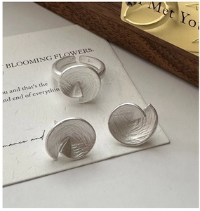Detail of matte S925 silver ring and earrings set with S925 hallmark on inner band