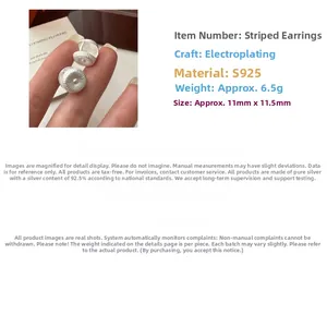 Detail view of S925 sterling silver hoop earrings with matte finish and 11mm dimensions