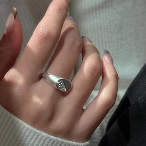 Minimalist S925 sterling silver ring with matte texture and unique asymmetric design