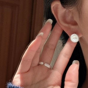Minimalist S925 sterling silver jewelry set featuring textured stud earrings and open ring