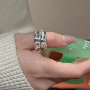 Minimalist S925 sterling silver wide band ring with vertical striped texture on finger