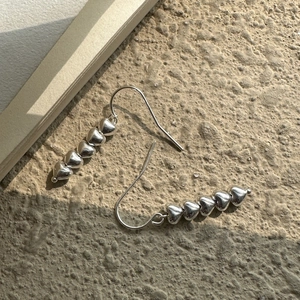 S925 sterling silver heart drop earrings featuring five small linked polished hearts
