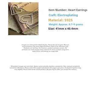 Macro detail of S925 sterling silver heart earrings with brushed texture, size 41mm x 40.4mm