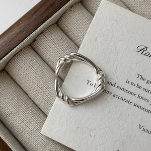 S925 sterling silver knotted twist open ring with a polished minimalist aesthetic