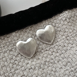 Minimalist S925 sterling silver heart stud earrings with a matte brushed finish
