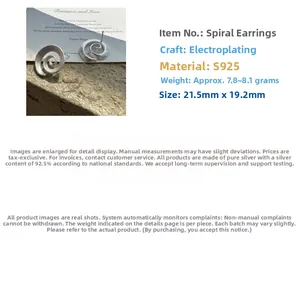 Detailed view of spiral S925 sterling silver earrings with a matte silver plated finish