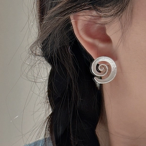 Minimalist S925 sterling silver spiral swirl earrings with matte brushed finish on model