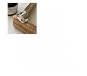 Detailed view of S925 sterling silver knotted moon ring with hallmark and weight specs