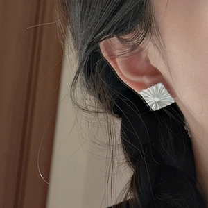 Minimalist S925 sterling silver matte square stud earrings with radial texture on model