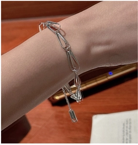 Detailed close-up of S925 sterling silver hollow geometric link bracelet with adjustable chain